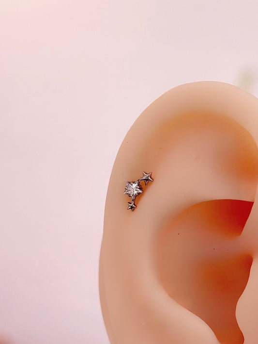 Piercing titanio constelación